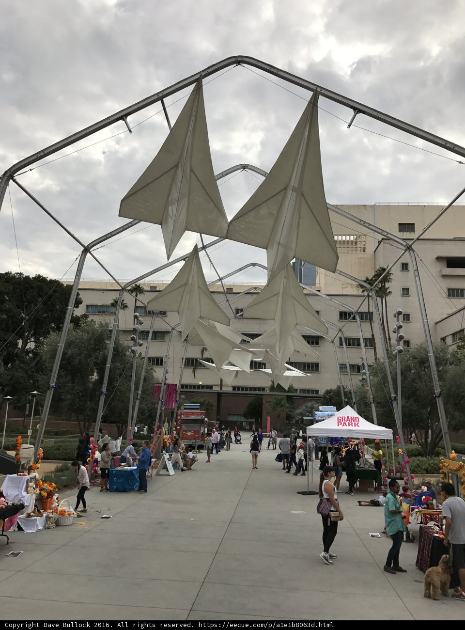 A Crowded Pathway Under Shelter