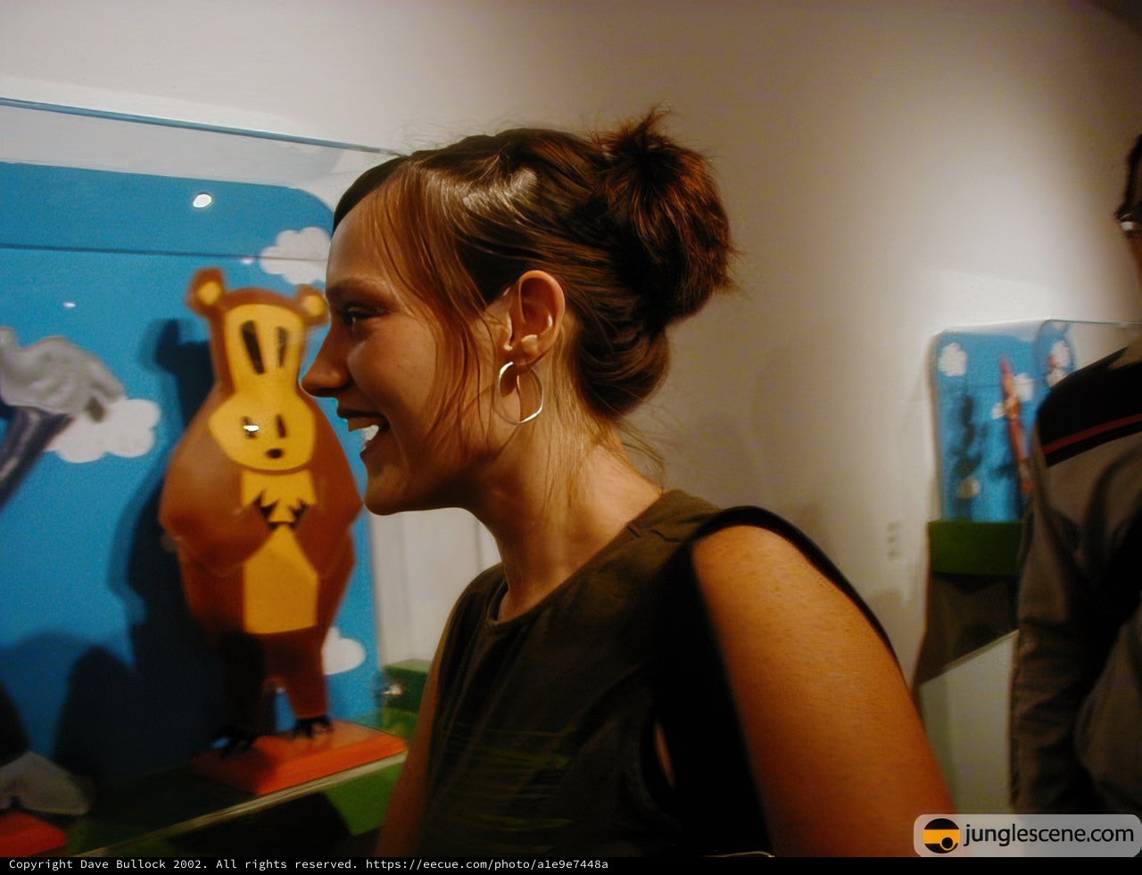 Smiling with a Stuffed Friend