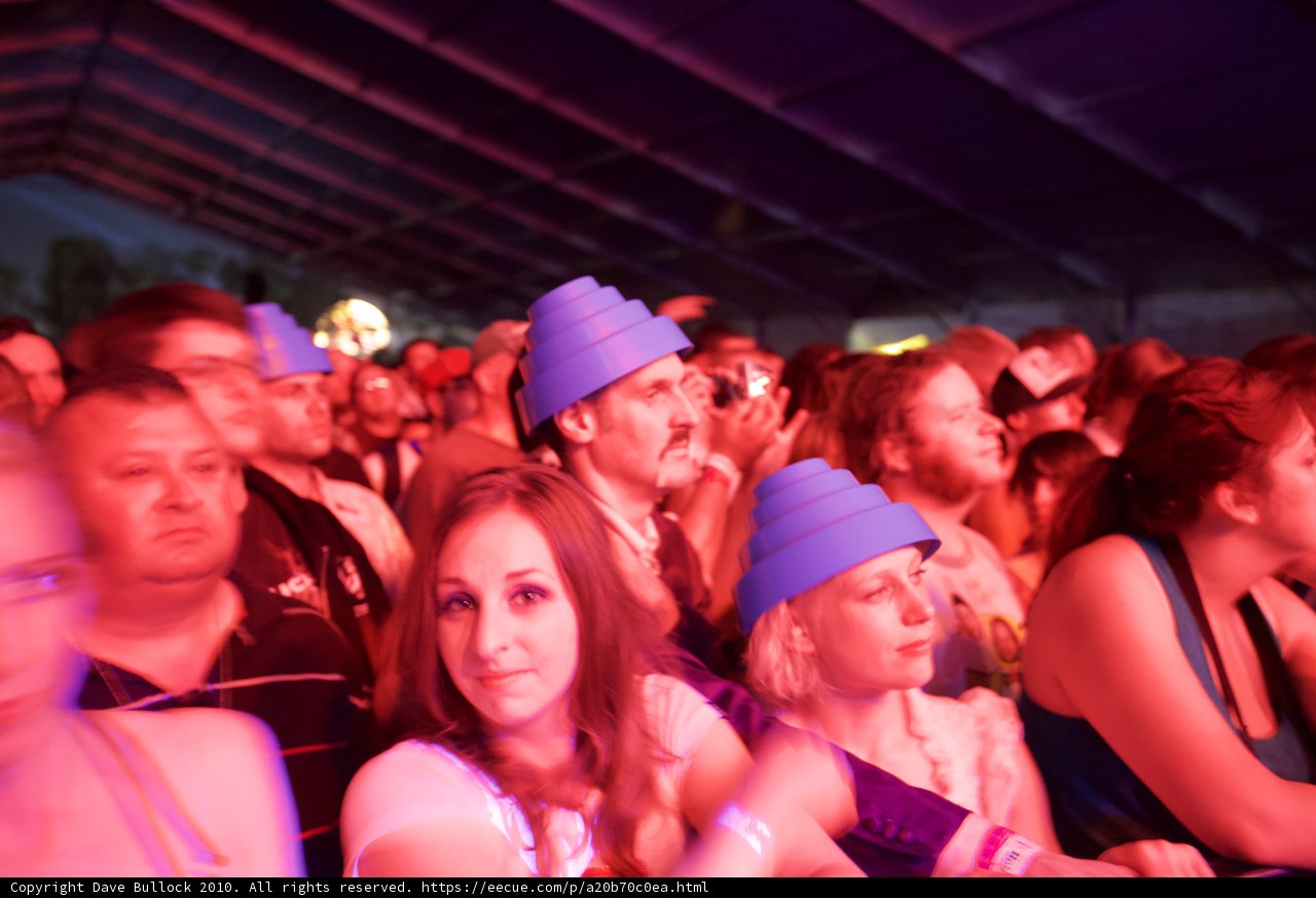 Nightclub Fun with Hats and a Crowded Crowd