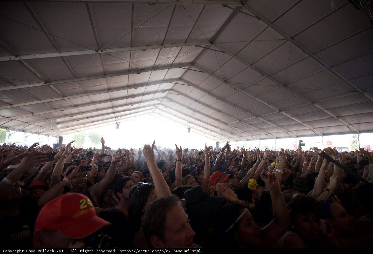 Crowd Goes Wild Caption: The audience at Coachella Day 2 can't contain their excitement during a concert.