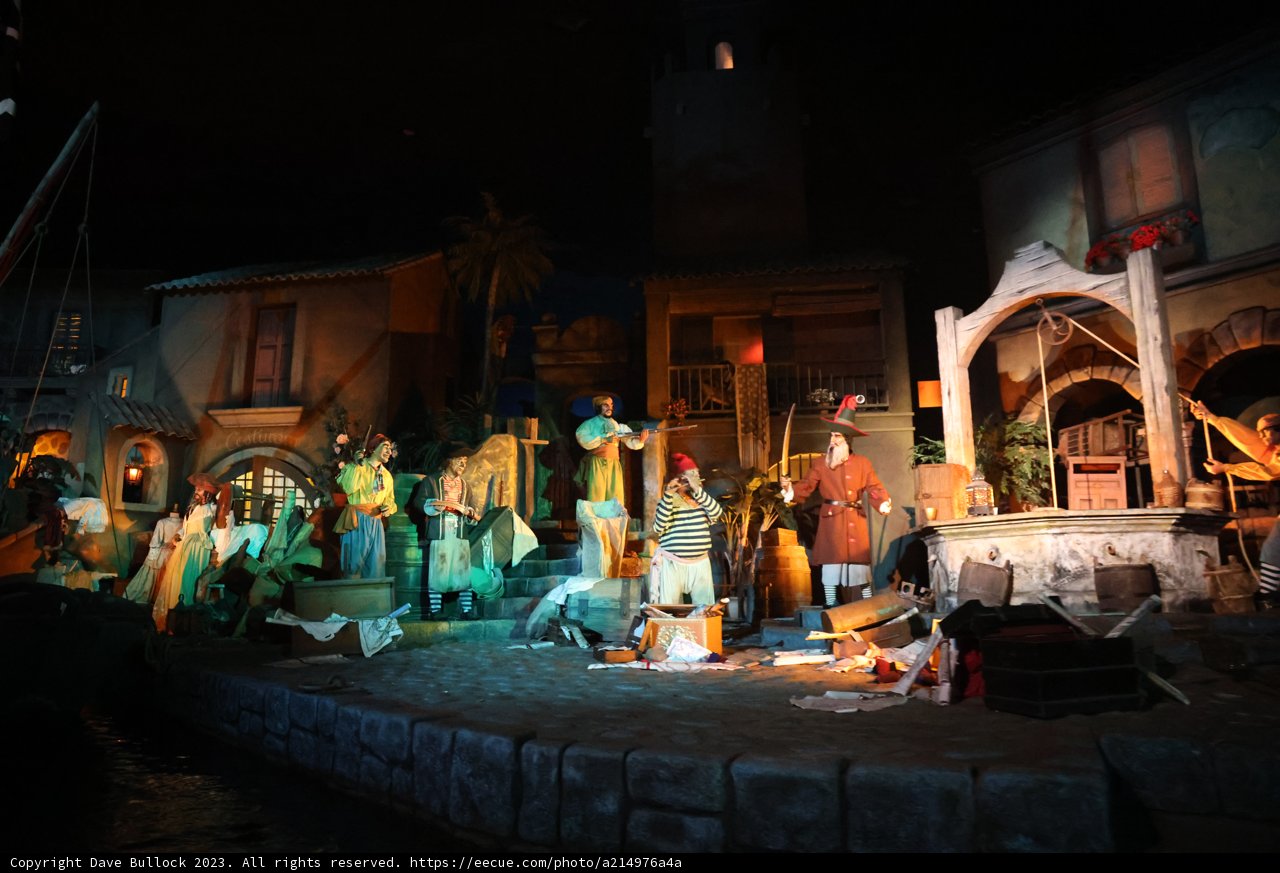 Nighttime Spectacle: A Costumed Crowd Gathers at an Urban Landmark