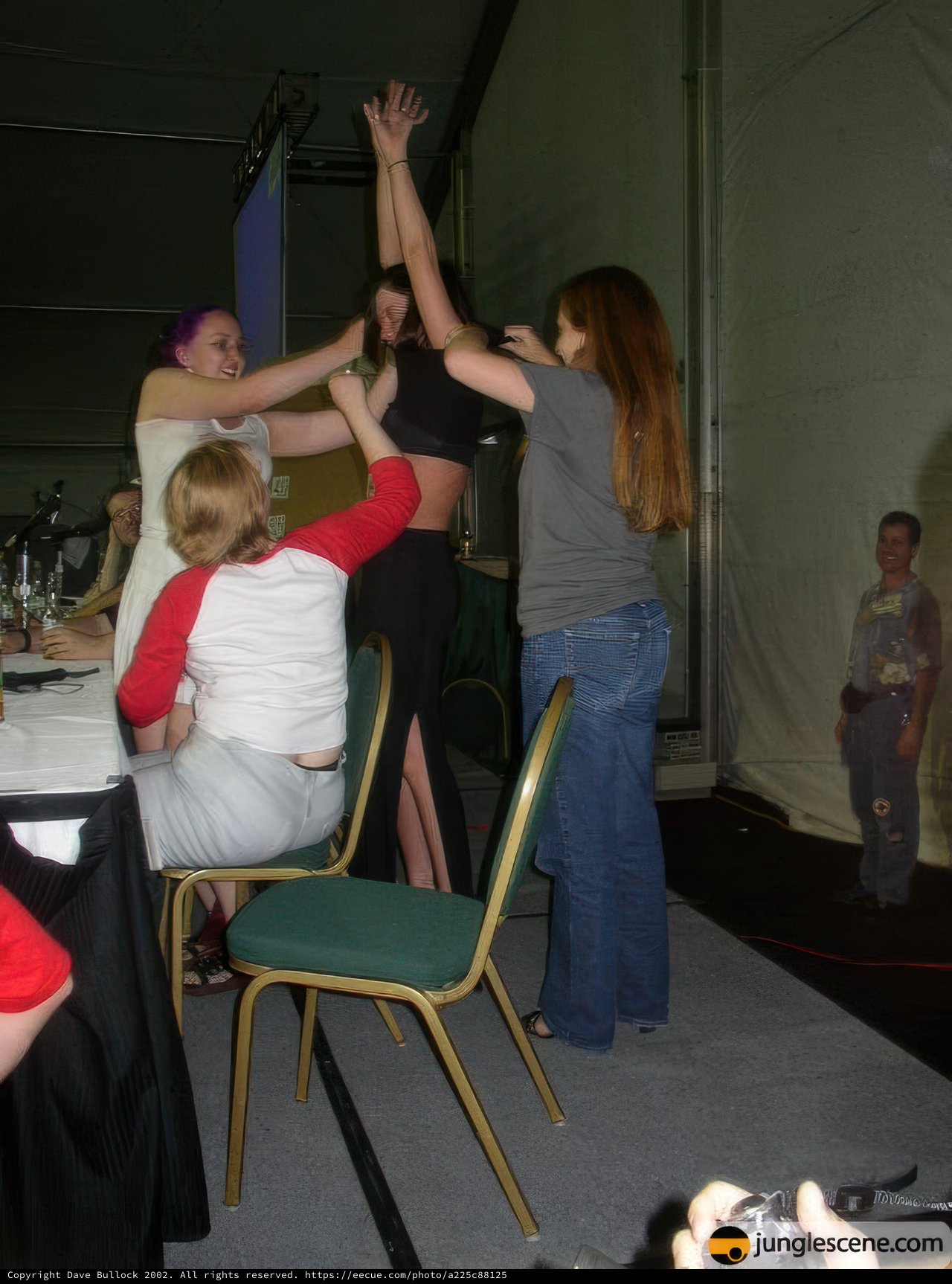 Group Gathering Around Dining Table