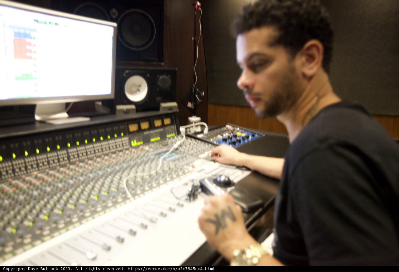 Marc Kinchen mixing tracks in recording studio