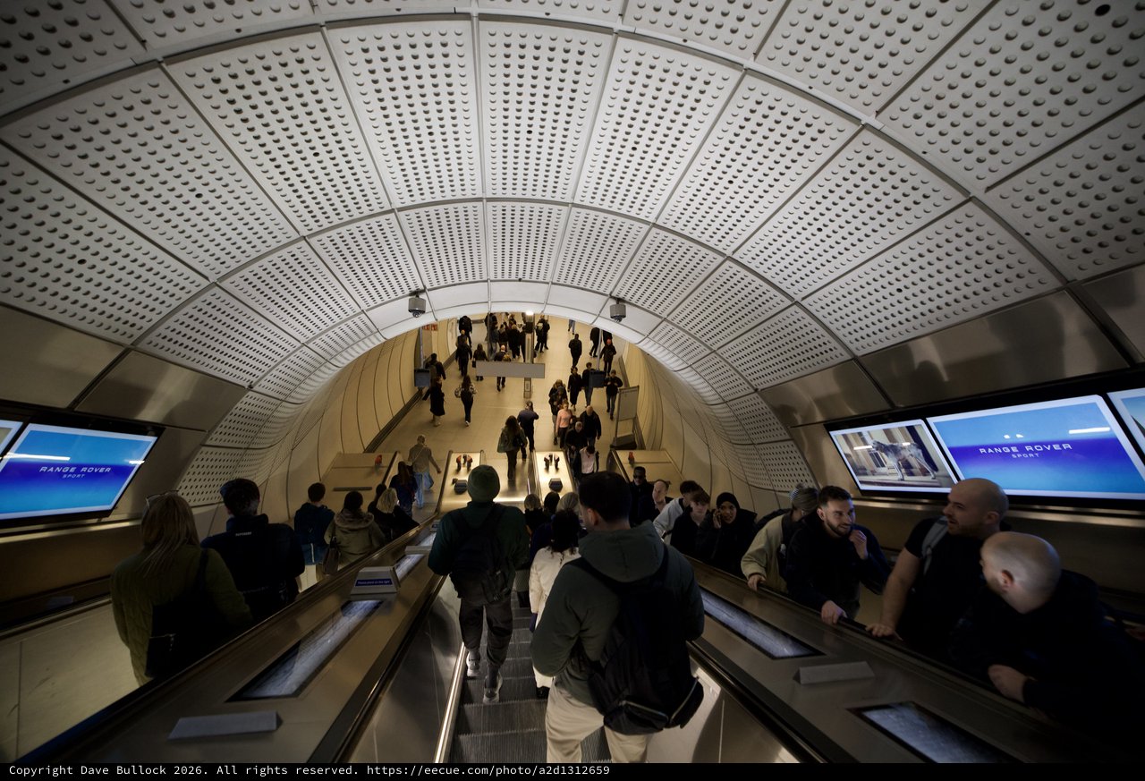 Rush Hour Commuters on London Underground Escalator