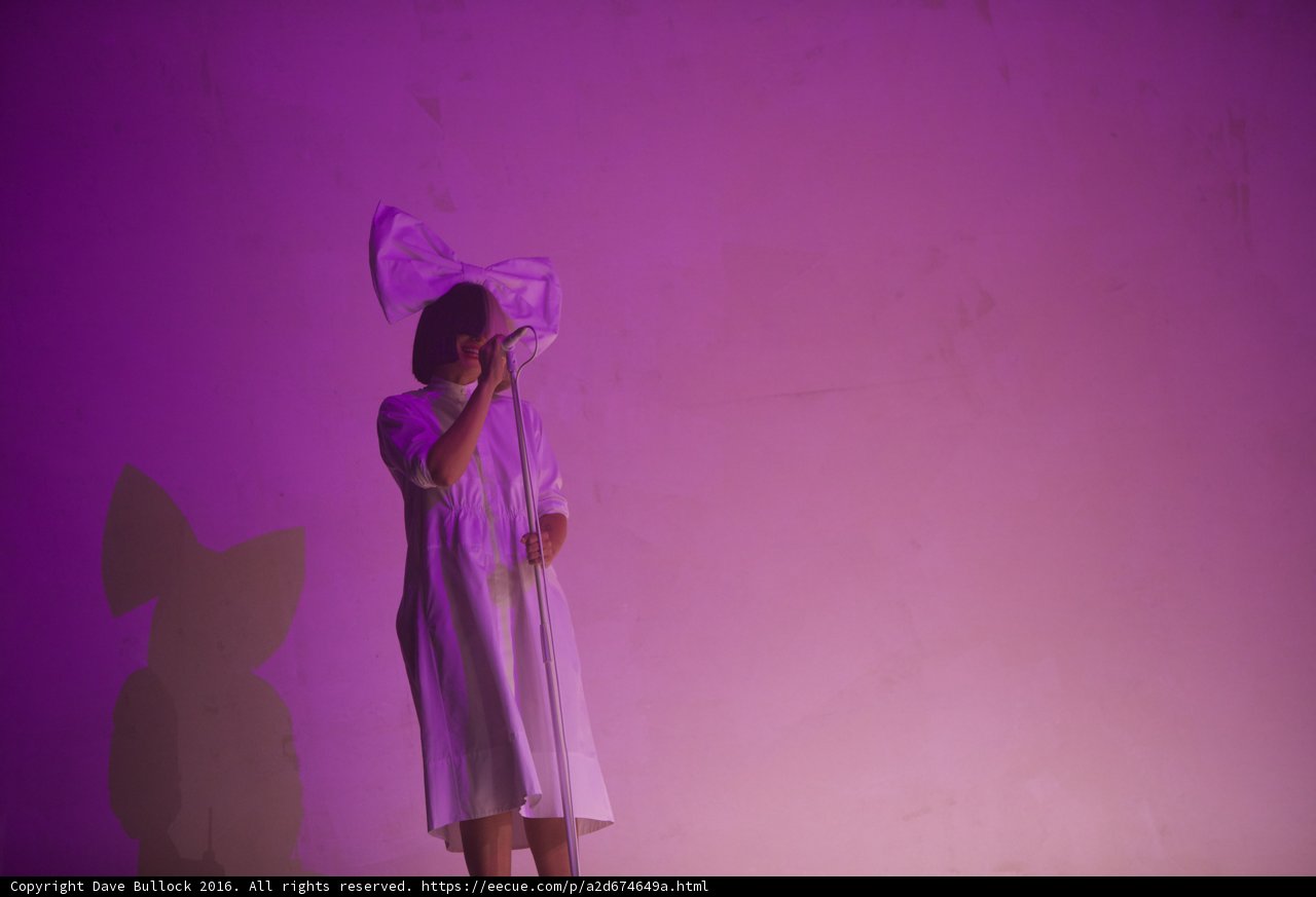 Soloist in White: A Captivating Evening Dress on Stage