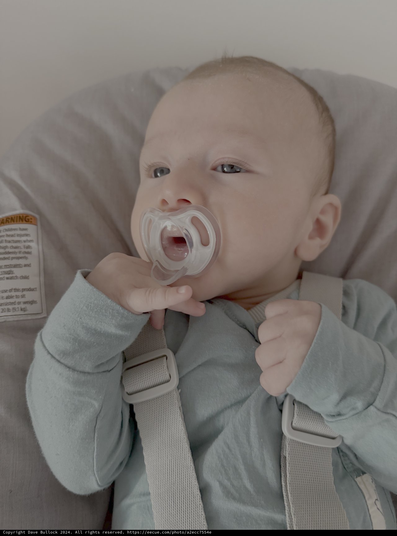 Baby in Car Seat with Pacifier