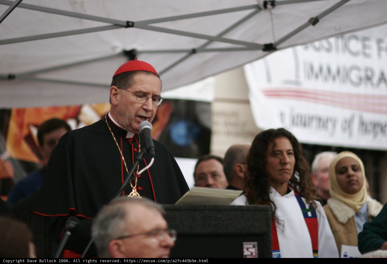 Bishop Roger Mahony Addresses Rally with Microphone