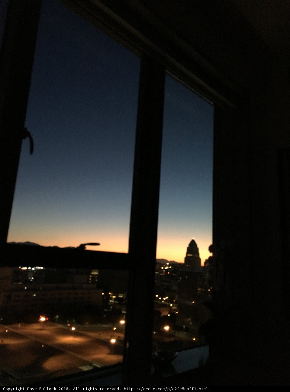 Night Silhouette of a Cityscape from a Window