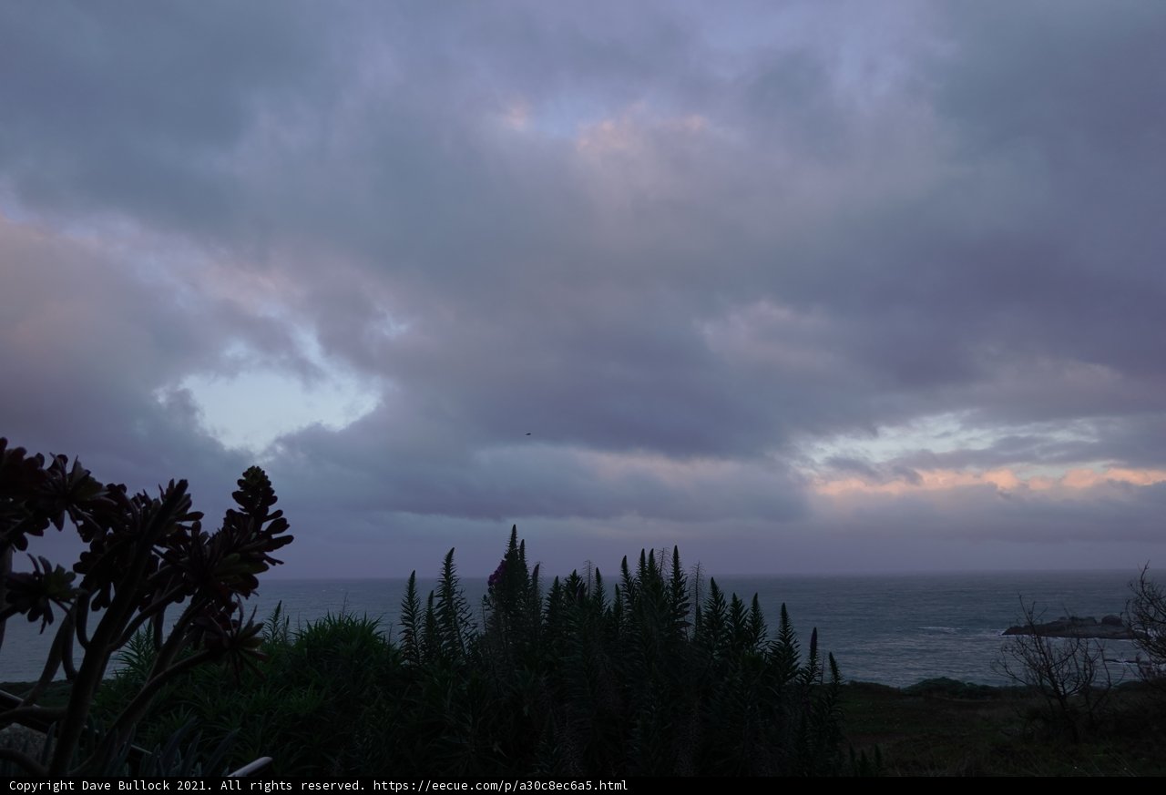 Hilltop View of a Majestic Ocean and Cloudscape