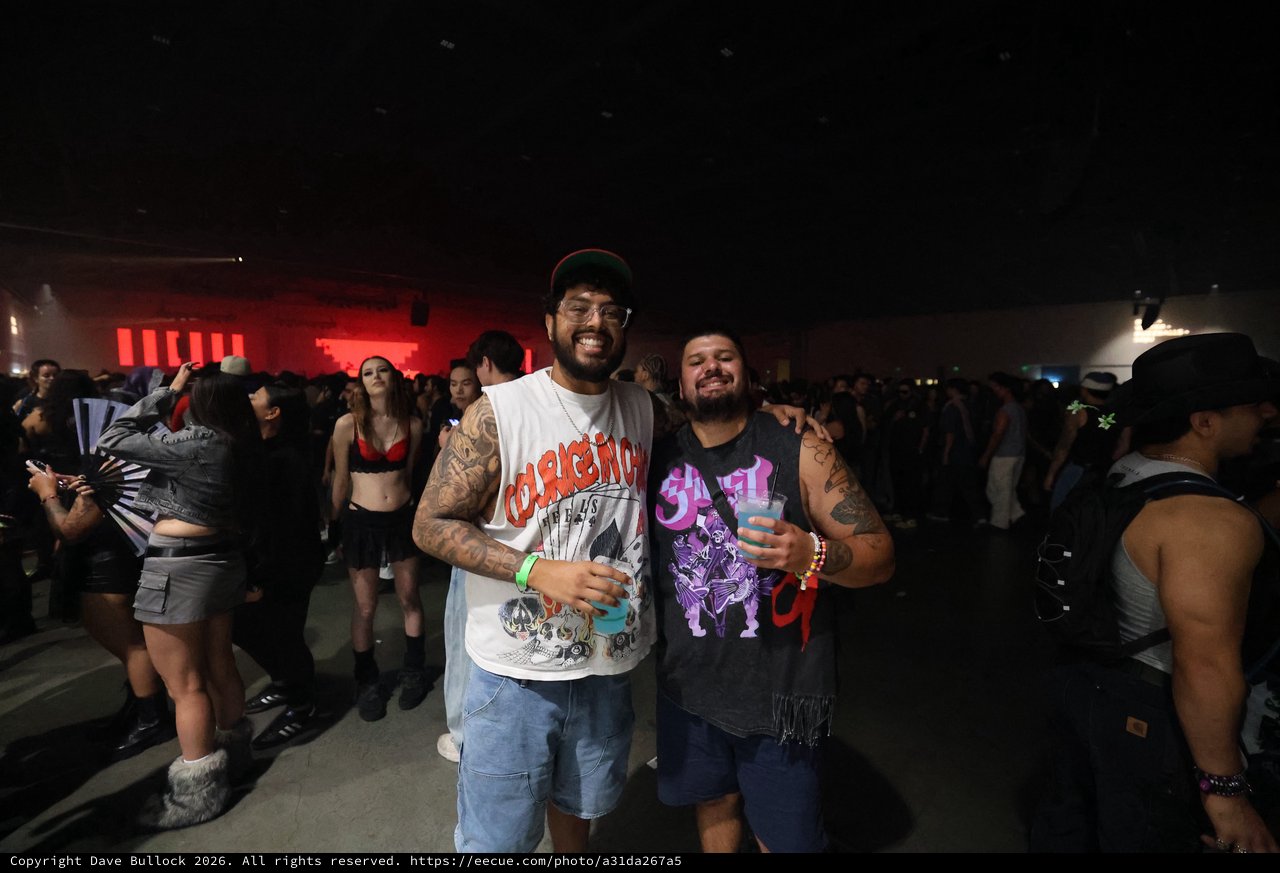 Friends Smiling Together at Wobbleland Music Festival