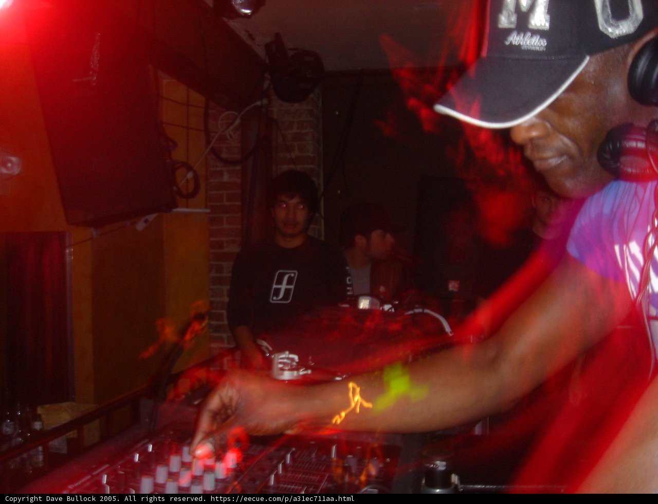 Purple Shirted Deejay in the Club
