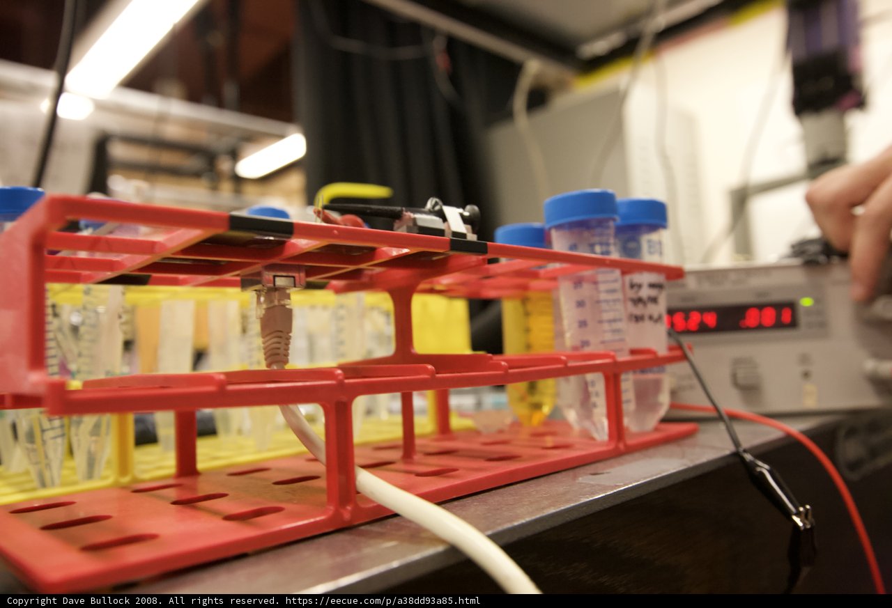 Working on a Device with Red and Yellow Rack