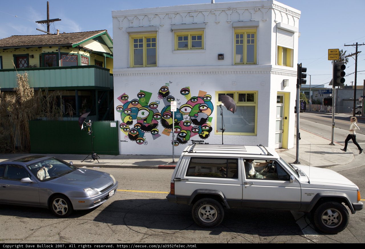 White Jeep Parked in Front of a Building