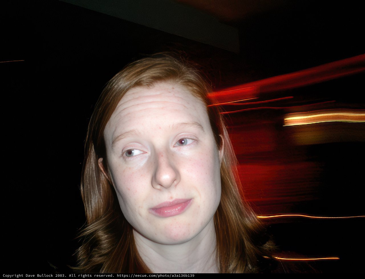Redheaded Woman in Urban Night