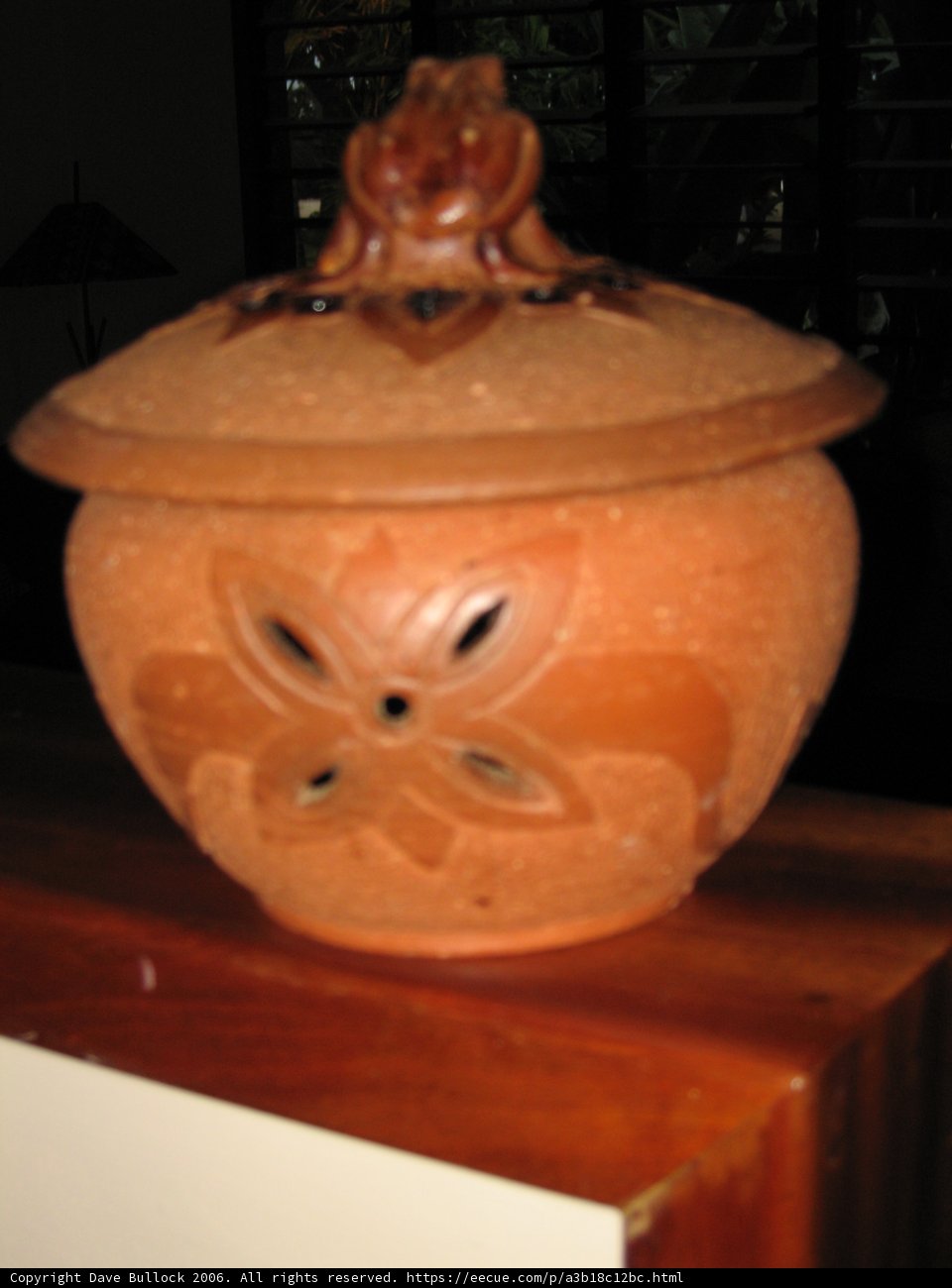 Brown Ceramic Jar on Wooden Table