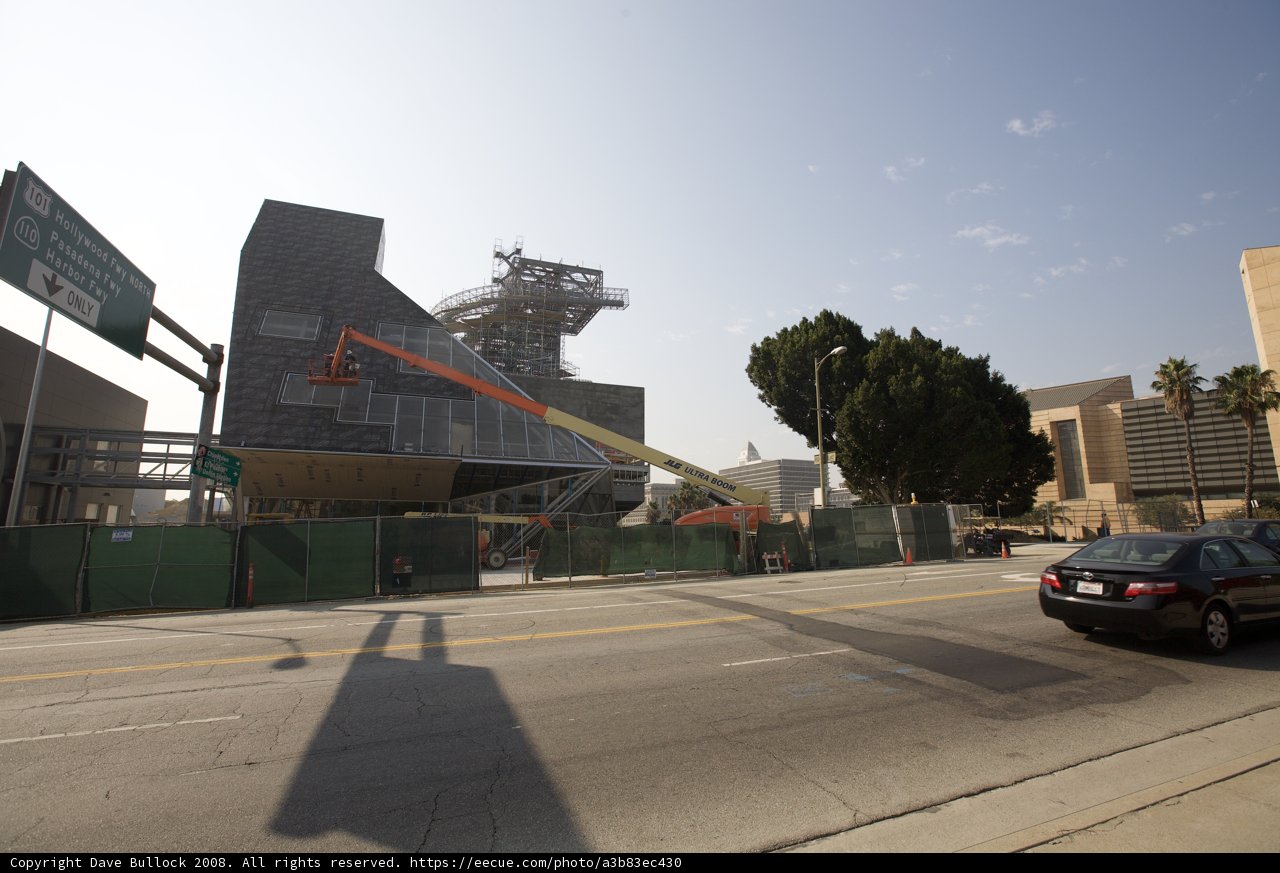 City driving by the construction site