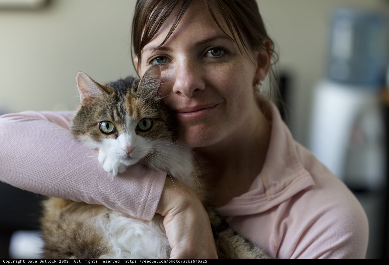 Woman and Her Tabby Cat Share Tender Moment