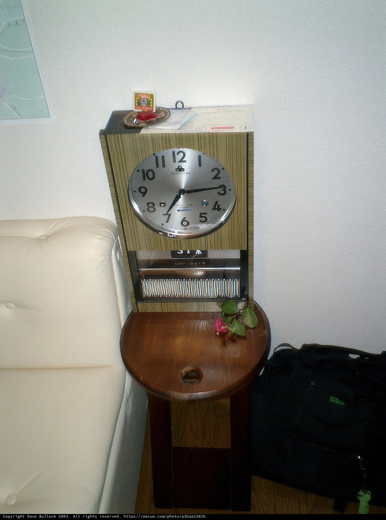 Timepiece on Wooden Table