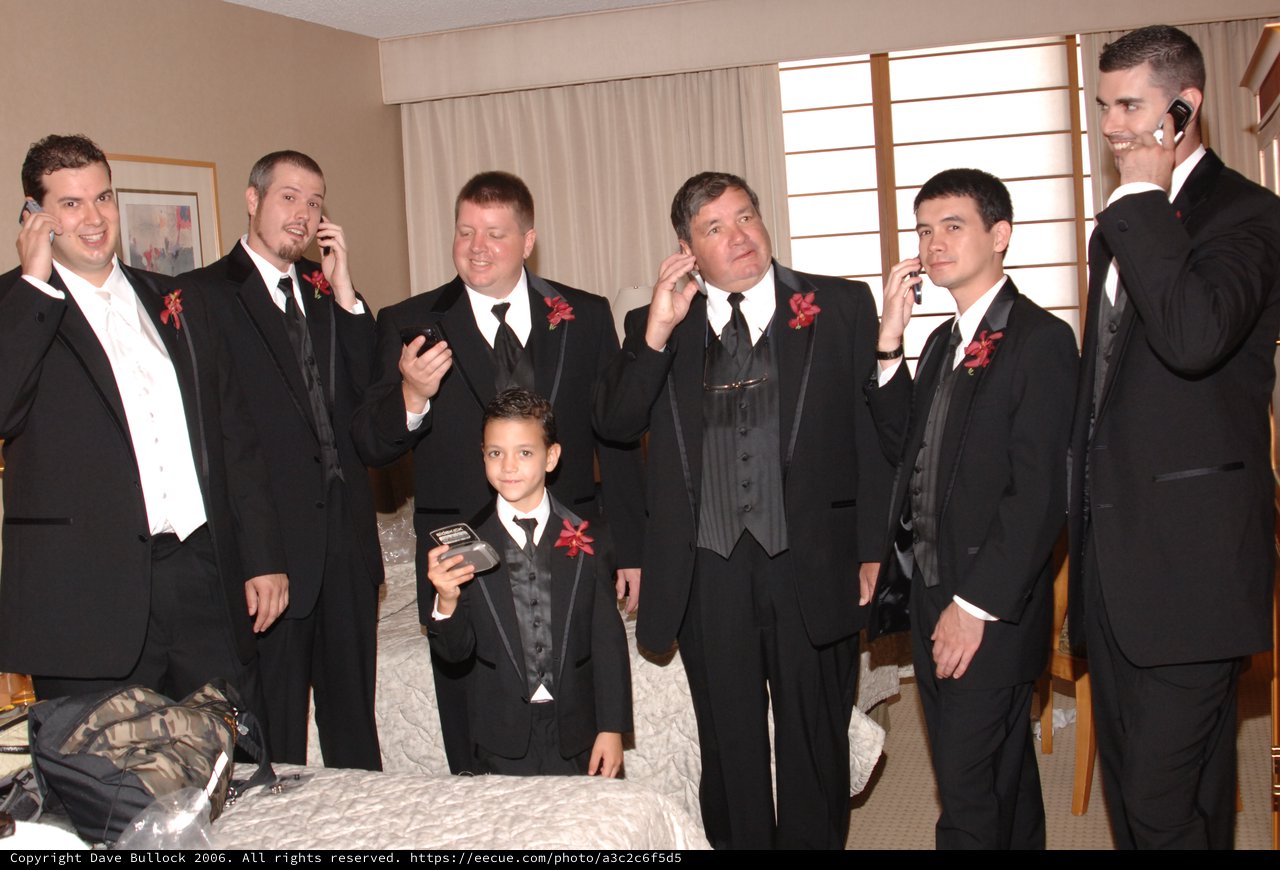 Groomsmen Humorously Talk on Phones Before Wedding