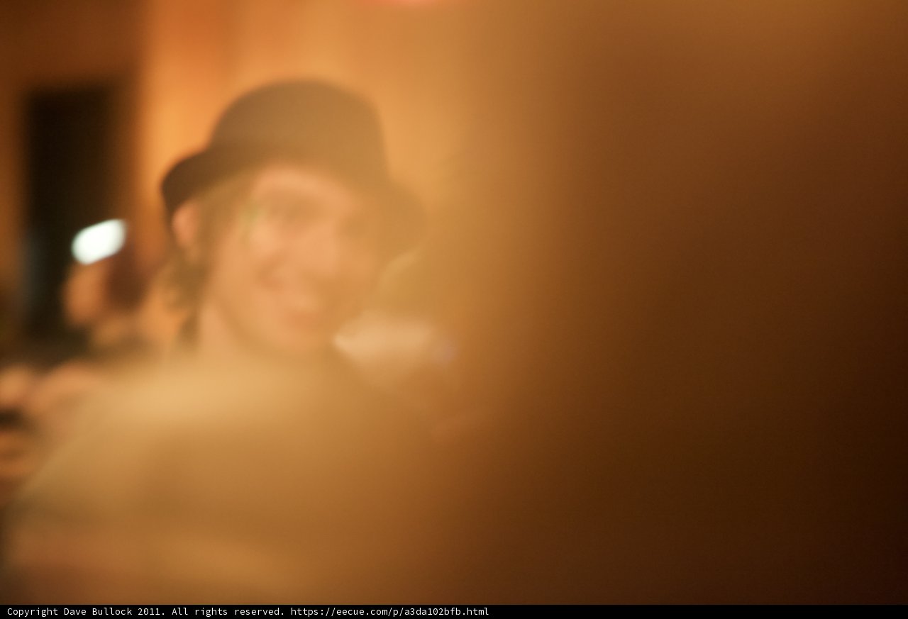 Blurry Man in a Sun Hat