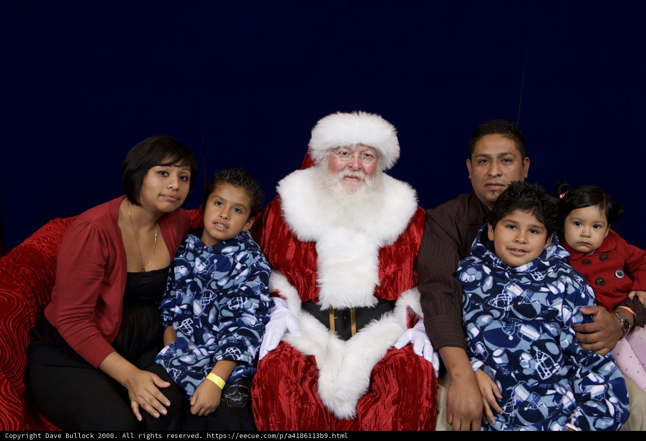 Family Christmas photo with Santa Claus