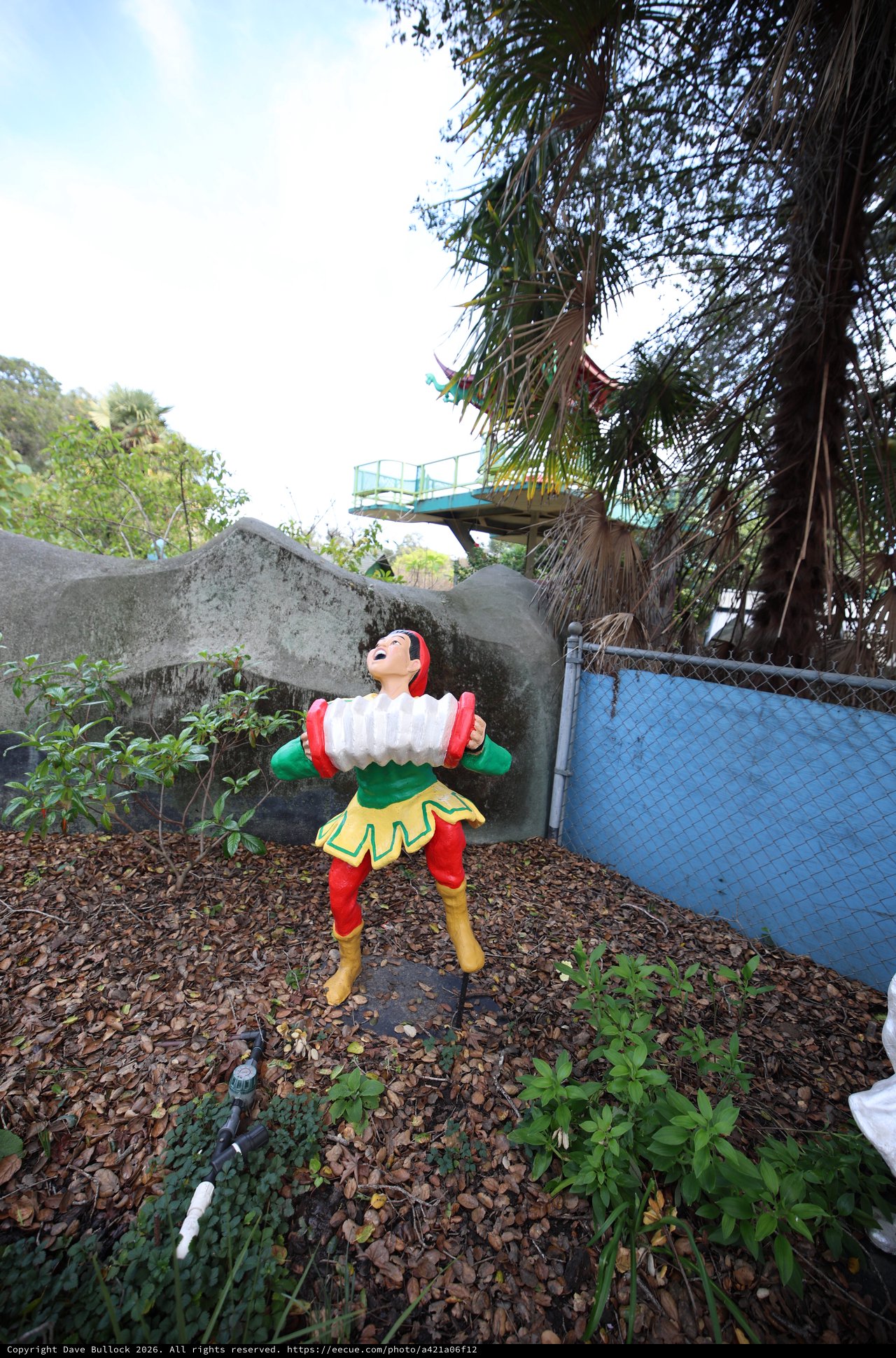 Vintage Strongman Figure at Abandoned Amusement Area
