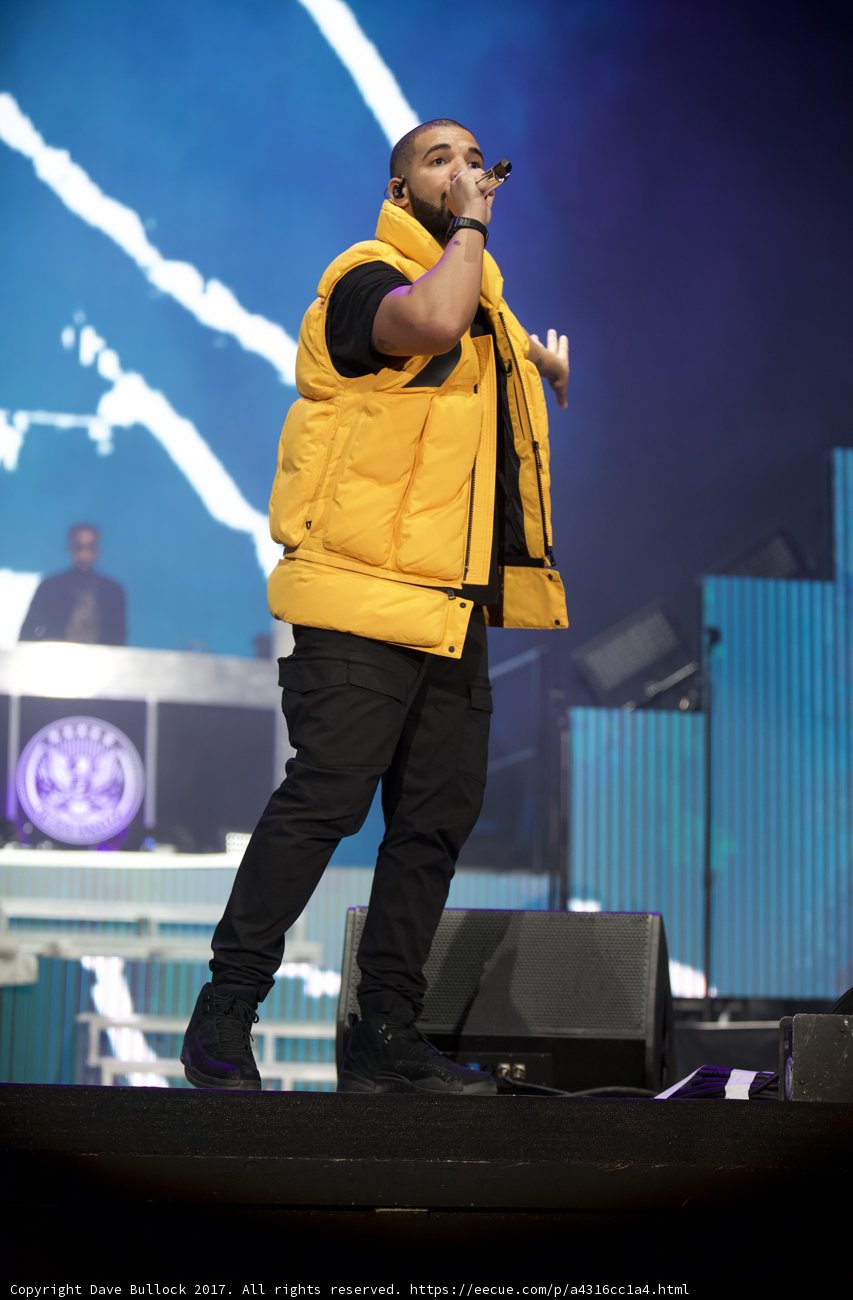 Drake performs solo on Coachella stage in yellow vest