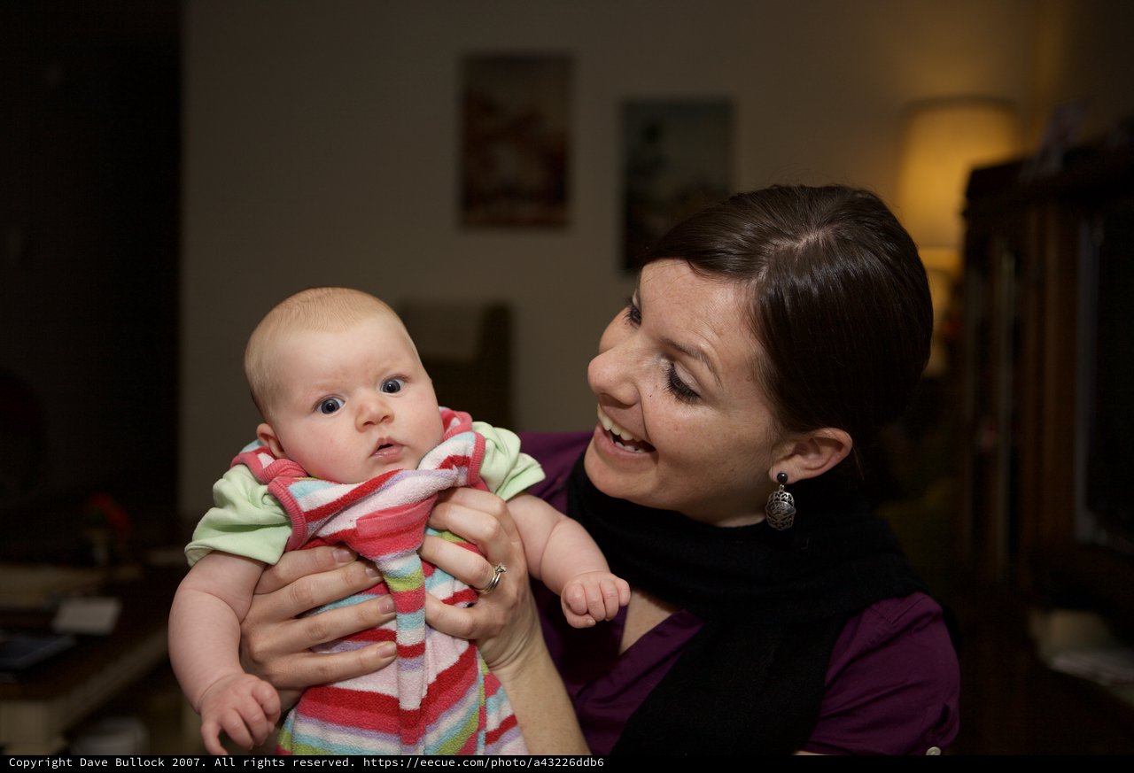 Mother's Joy: Tender Moment with Newborn Baby
