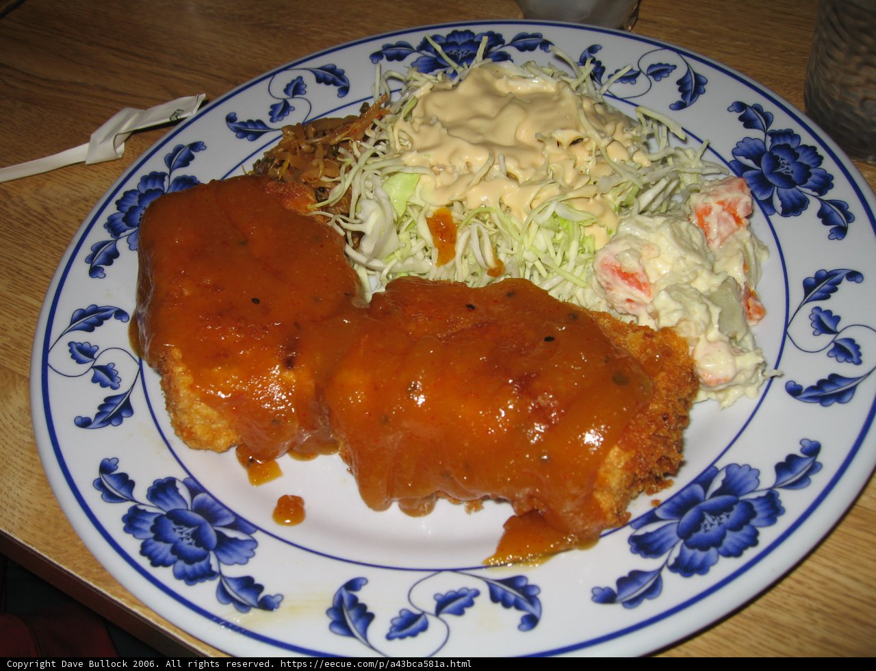 Delicious Plate of Food with a Side of Refreshing Coleslaw