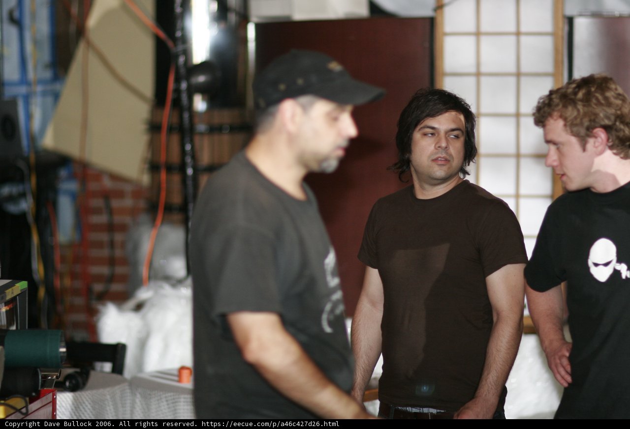 Man in Black T-Shirt and Baseball Cap
