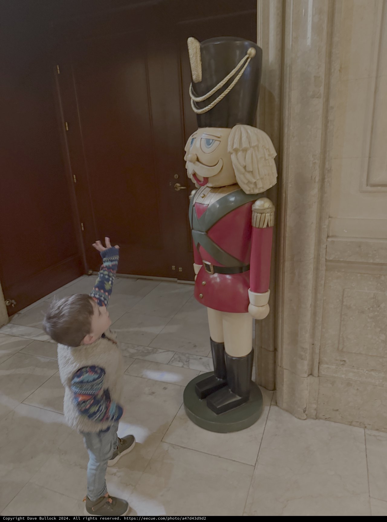 Child Discovers Life-Sized Nutcracker Holiday Decoration