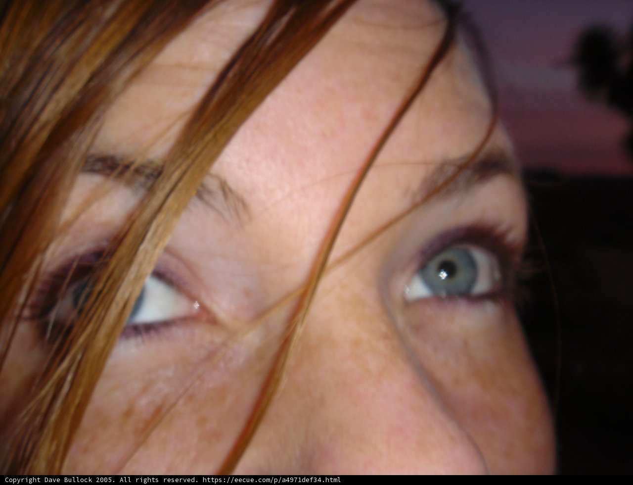 Blue-Eyed Freckled Woman
