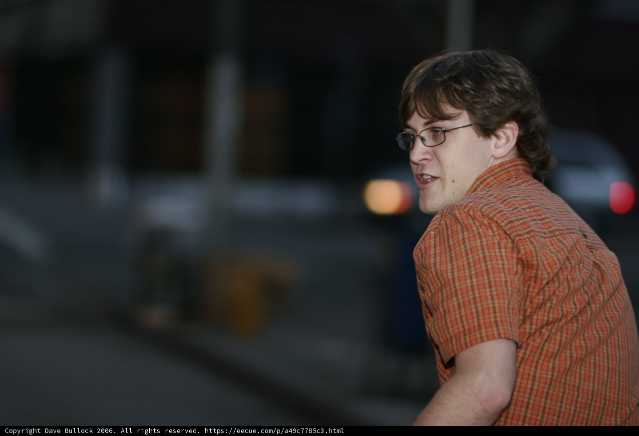 Smiling Man with Glasses
