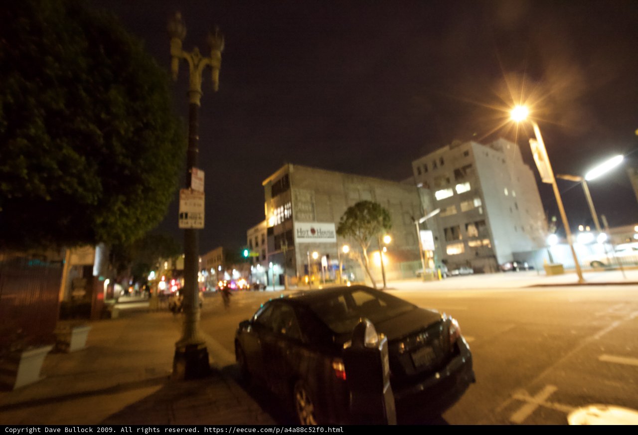 Parked Car on the Busy Street