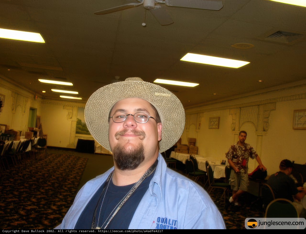The Hat-Wearing Gentleman in the Dining Room