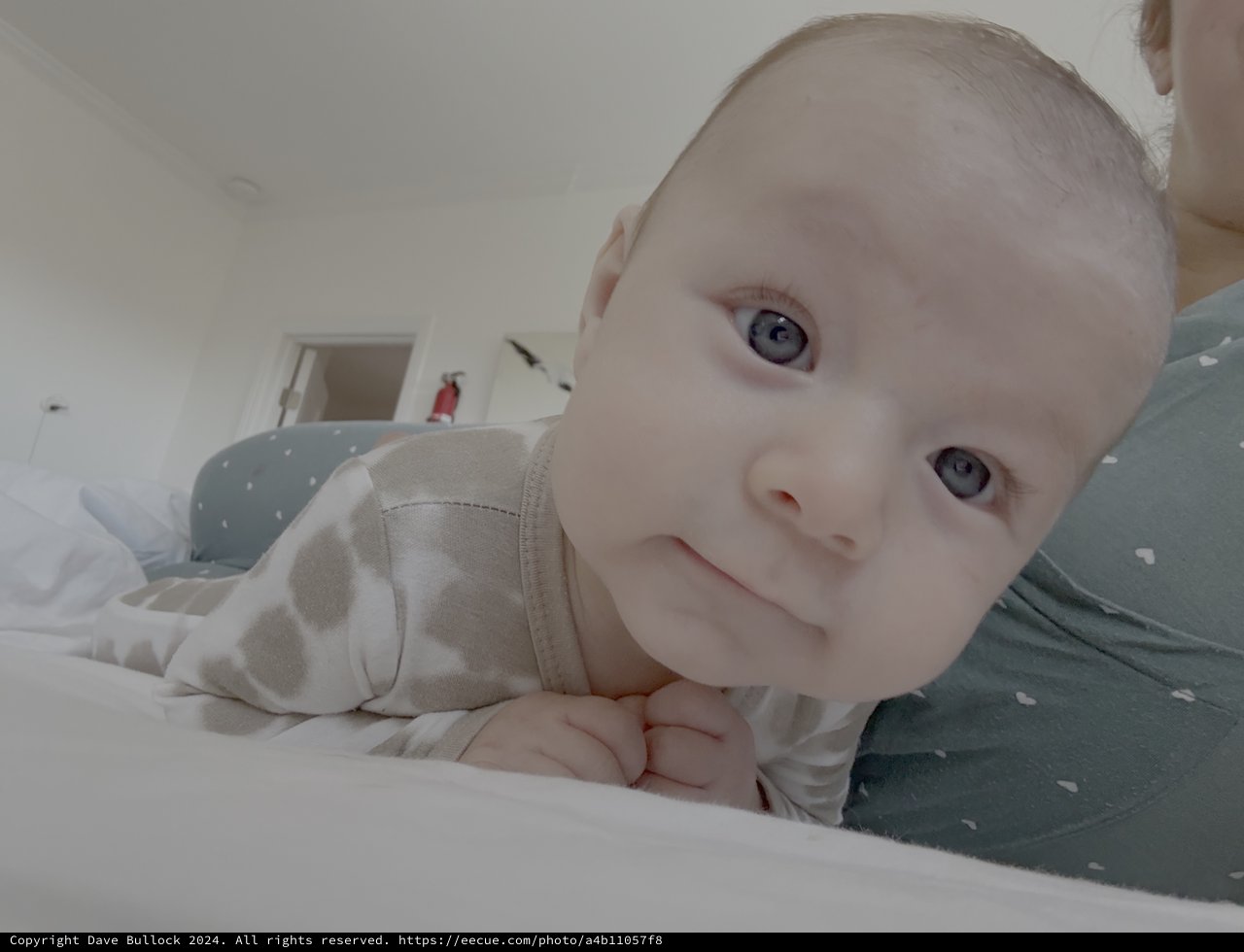 Sweet Baby Portrait on Cozy Bed