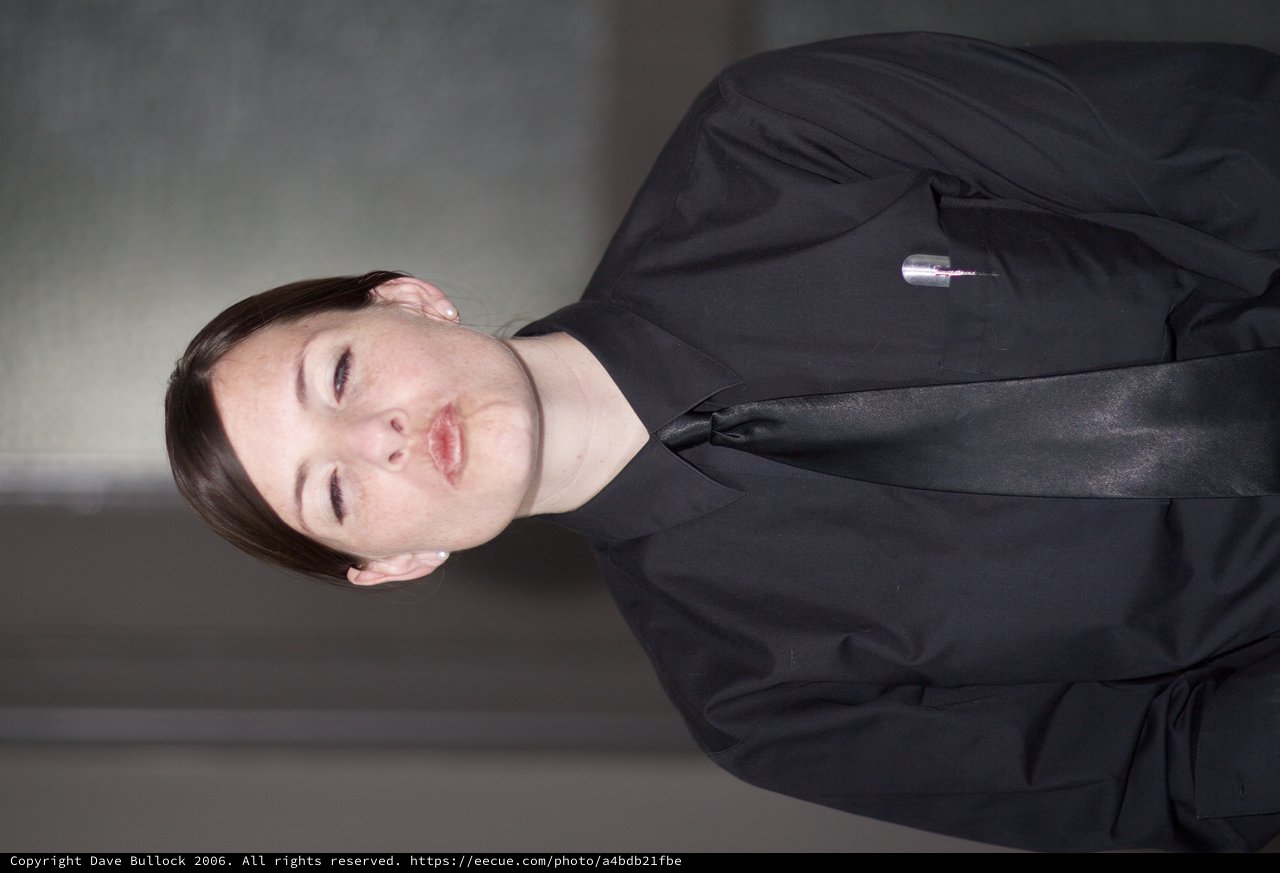 Deadpan Security Guard Portrait with Pouty Expression