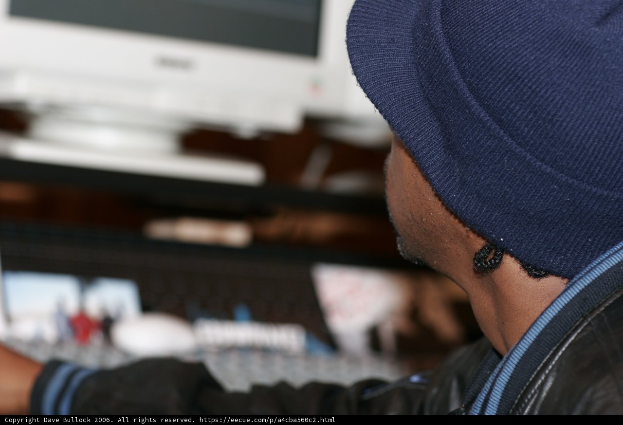 Black Jacketed Man in a Beanie