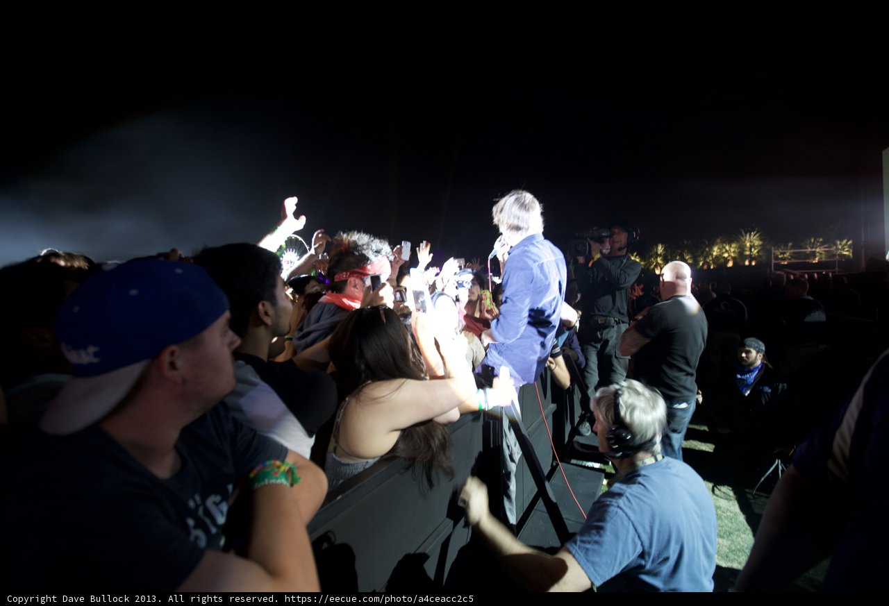 Man in Suit Addresses Coachella Crowd