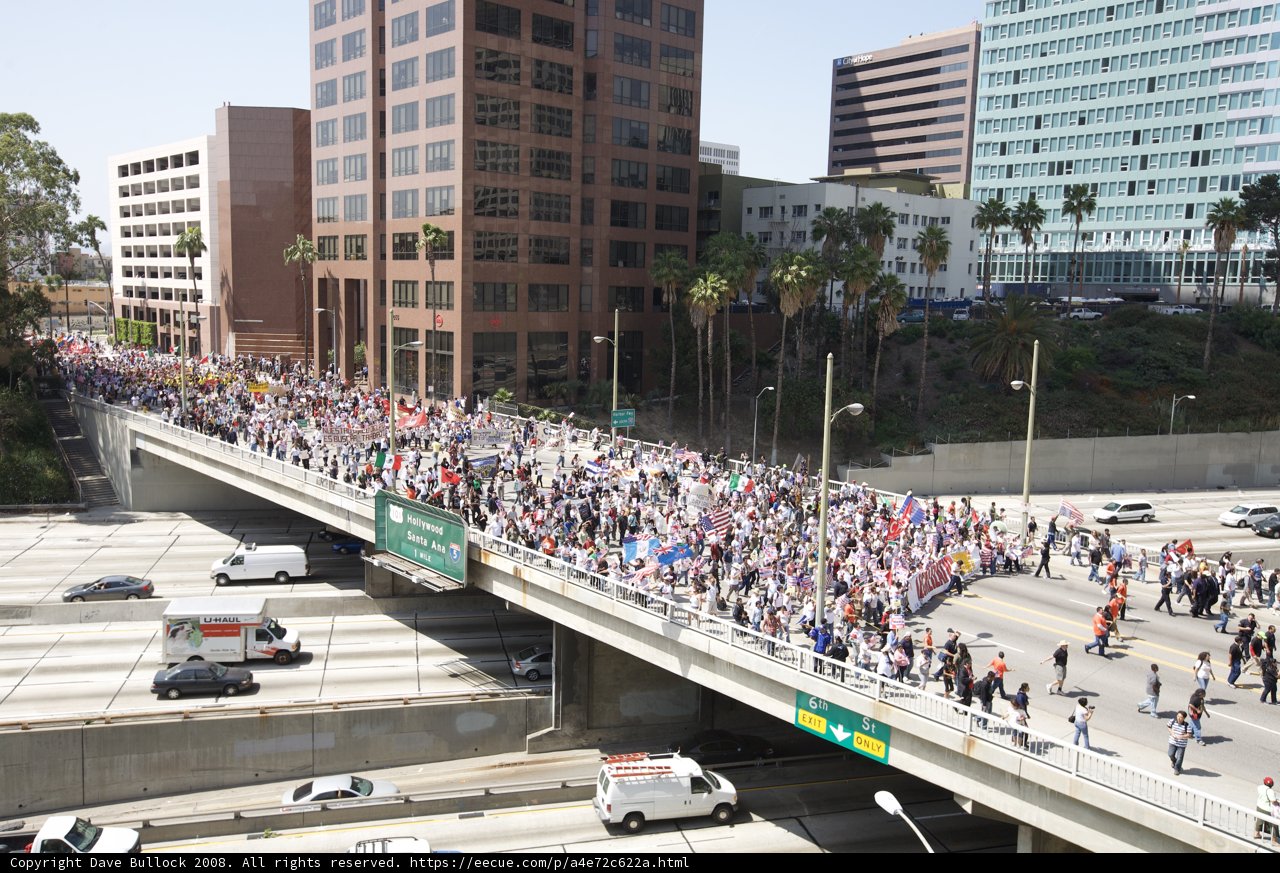 Mayday Rally Draws Crowds to City Overpass