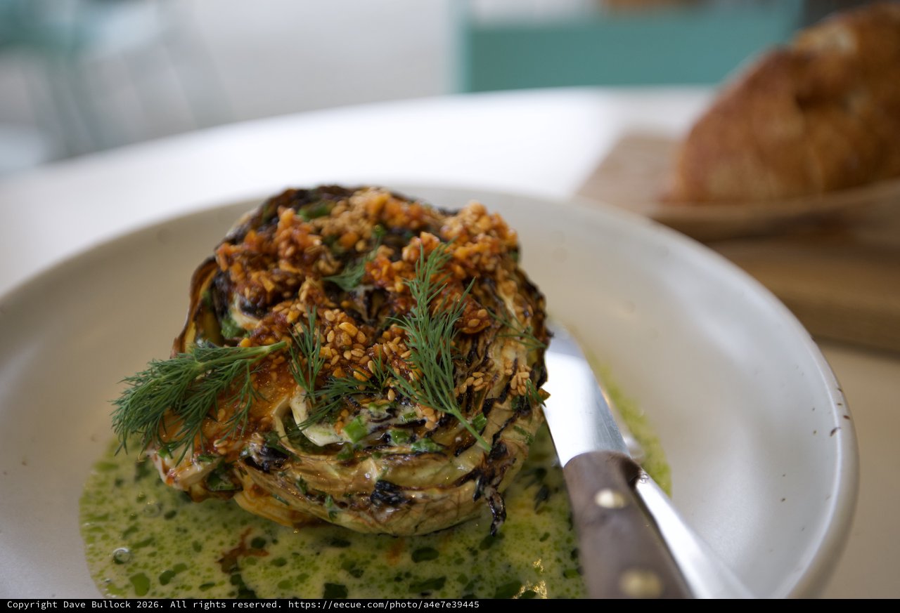 Roasted Cabbage with Sesame and Herb Garnish at Fine Dining Restaurant