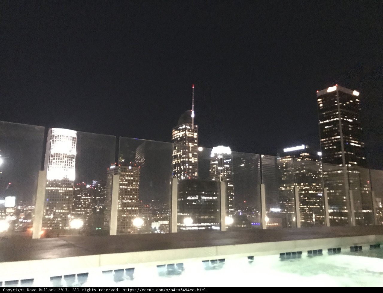 Nighttime Vista of LA's Metropolis from Rooftop Pool