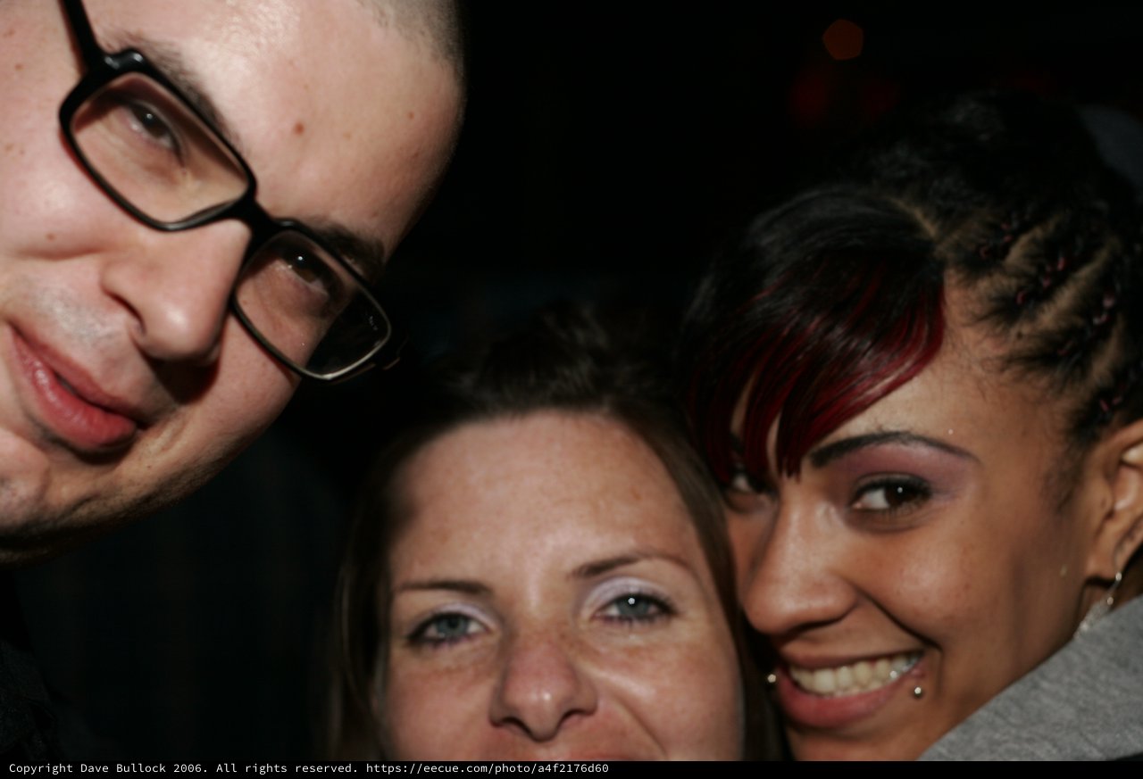 Three Friends Share a Close-Up Selfie Moment