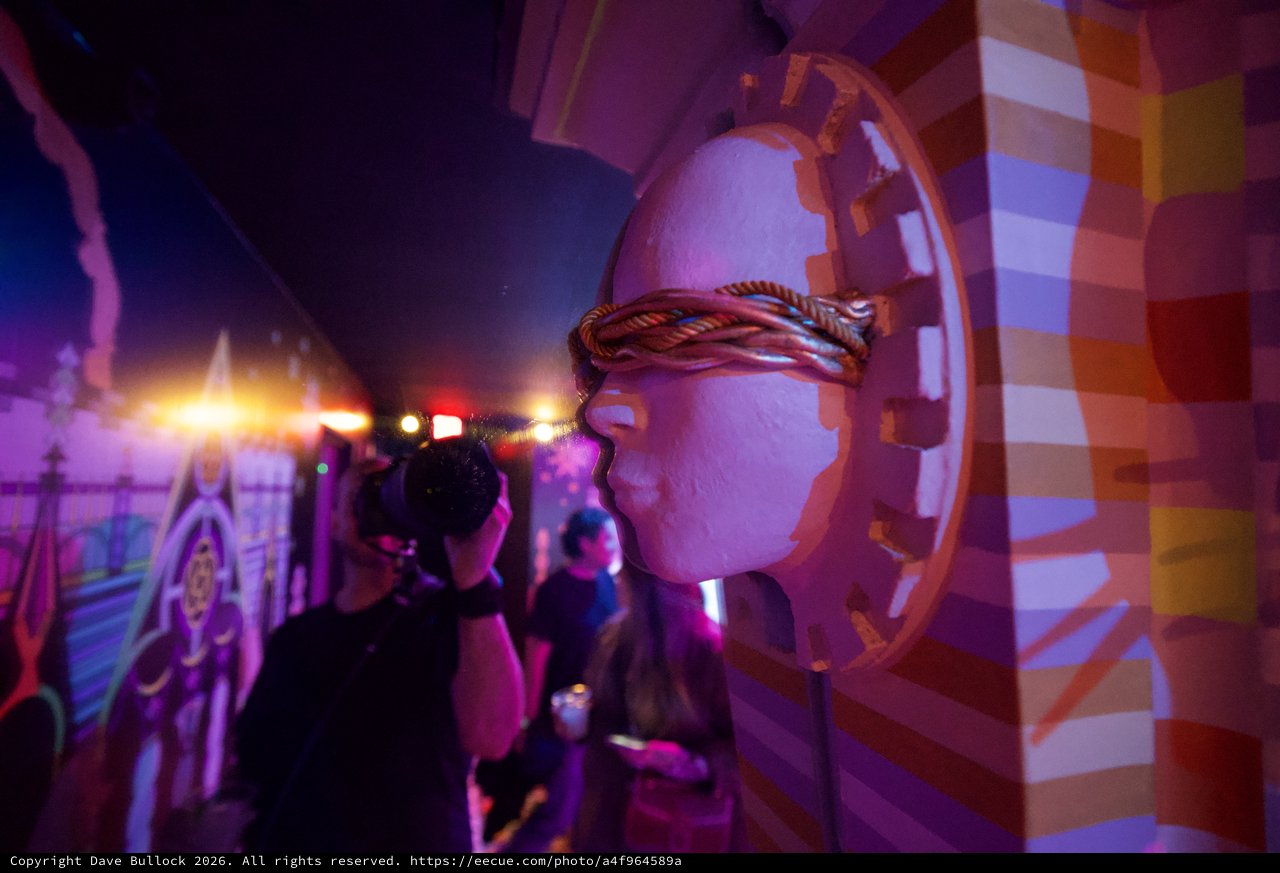 Illuminated Art Installation with Sculptural Elements and Atmospheric Lighting