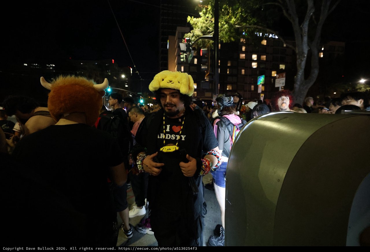 Festival Goer in Pompompurin Hat at Night Event