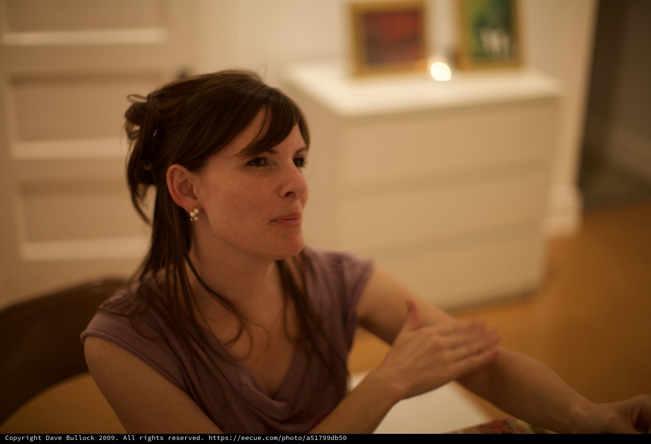 Thoughtful Woman in Warm Gallery Evening Light