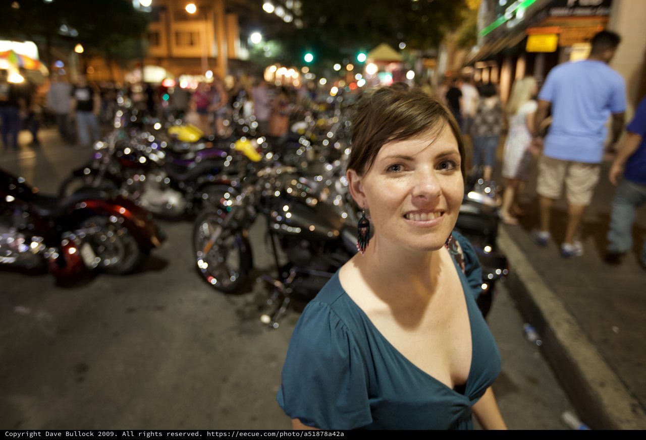 Smiling Woman at Night Motorcycle Rally Austin