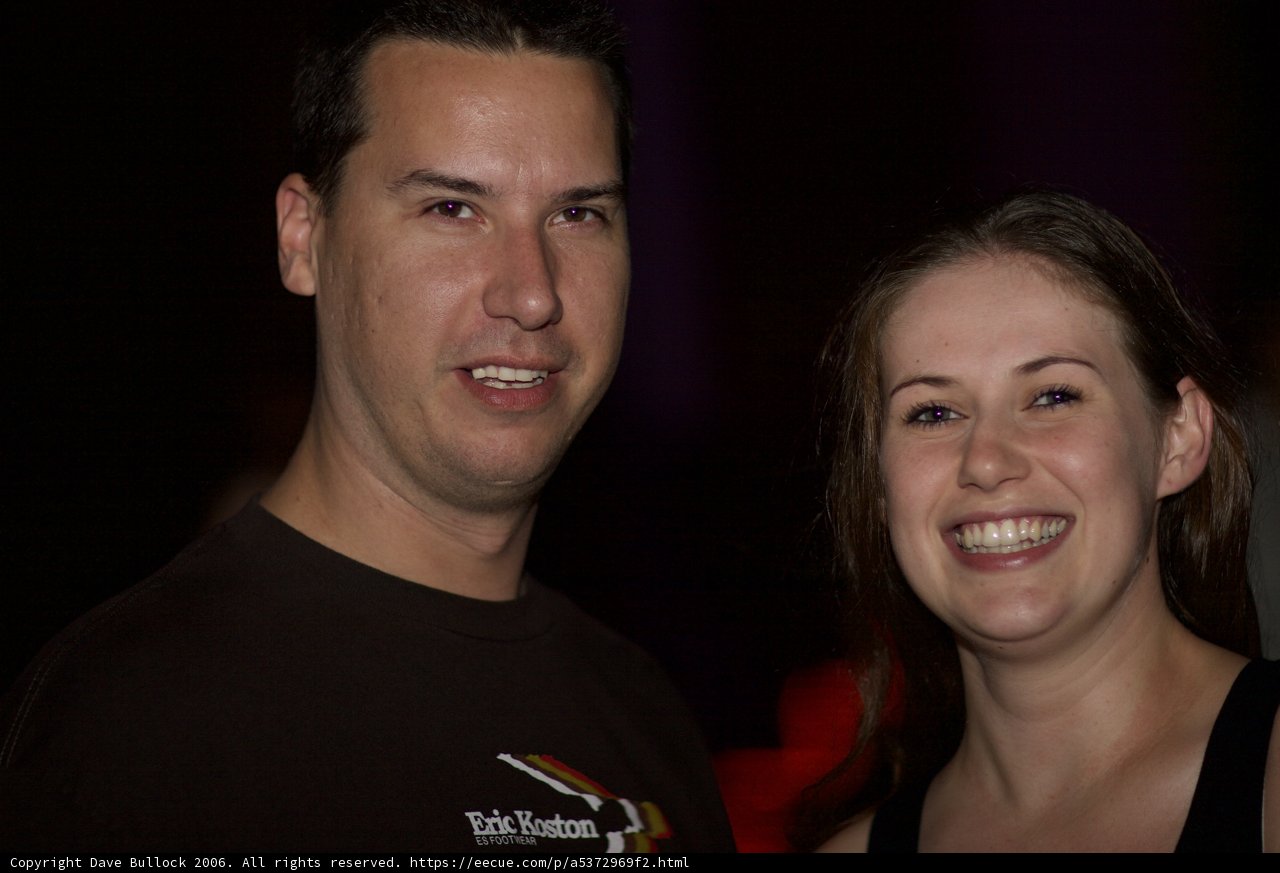 Smiling Couple in Matching T-Shirts