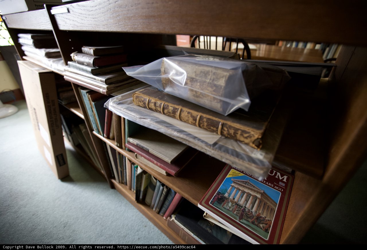 Bookshelf and Plastic Bag