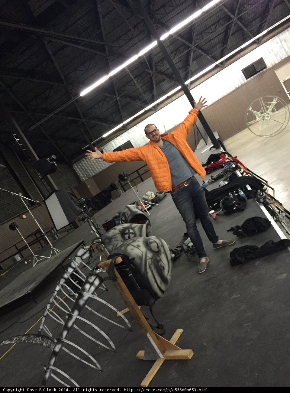 Man operating large machine in factory